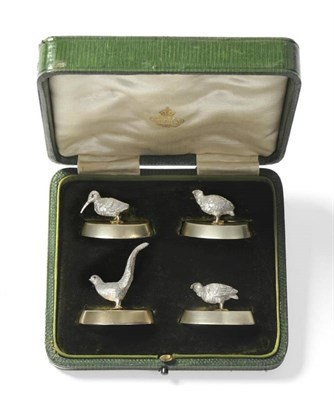 Lot 546 - A Set of Four Edward VII Silver Menu Holders, two Goldsmiths & Silversmiths Co Ltd, two...