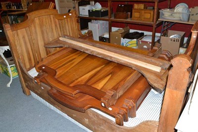 Lot 542 - A pair of Continental walnut single beds with mattresses