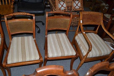 Lot 568 - Three Regency cane seated single dining chairs and a similar carver chair