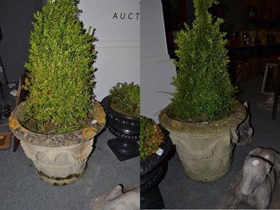 Lot 575 - A pair of large cast concrete planters