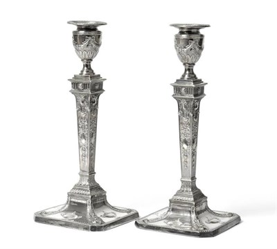 Lot 554 - A Pair of Edward VII Silver Candlesticks, maker's mark WL&S, Sheffield 1901/4, the canted...