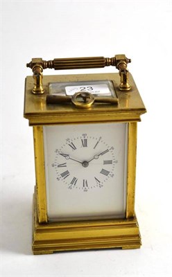 Lot 23 - A gilt brass striking and repeating carriage clock