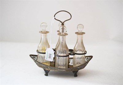 Lot 556 - A Late Victorian Four-Bottle Silver Vinegar/Oil Cruet, Heming & Co Ltd, London 1900, of scroll...