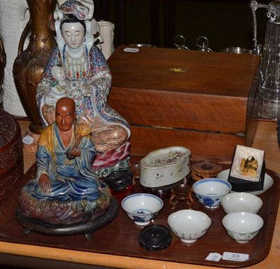 Lot 33 - Two blue and white 'wine' bowls, three others, figure of Guanyin, soap dish with provenance,...