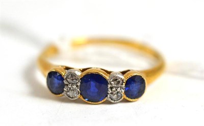 Lot 55 - A sapphire and diamond ring