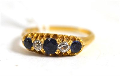 Lot 69 - An 18ct gold sapphire and diamond ring