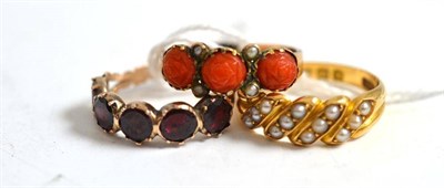 Lot 72 - An 18ct gold pearl set ring, a garnet ring and a coral and pearl ring