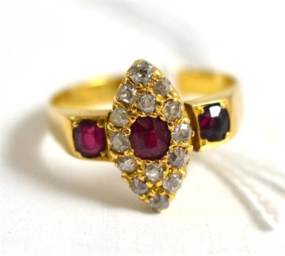 Lot 75 - A ruby and diamond cluster ring stamped '18ct'