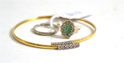 Lot 76 - A ring stamped 'PLATINUM', a bangle stamped '9kt' and a 9ct gold ring