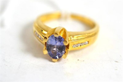 Lot 95 - An 18ct gold sapphire and diamond ring