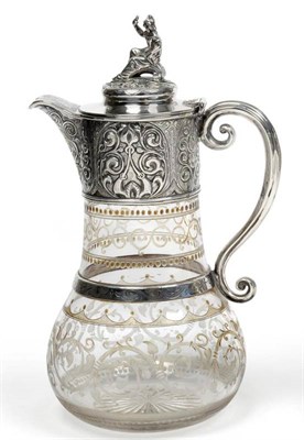 Lot 565 - A Victorian Silver Mounted Claret Jug, James Charles Eddington, London 1865, the bulbous glass...