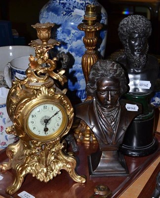 Lot 122 - A gilt metal mantel clock with enamel dial, two pedestal busts, giltwood table lamp base and a...