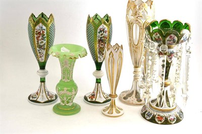 Lot 131 - A green glass table lustre with enamel floral decoration, pair of similar vases, a green...