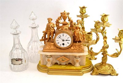 Lot 138 - Pair of candelabra, gilt metal figural mantel clock with enamel dial on a wooden stand, a pair...