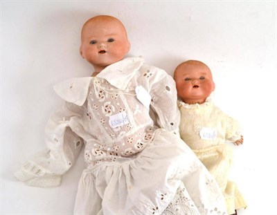 Lot 155 - Two Armand Marseille bisque flange head baby dolls