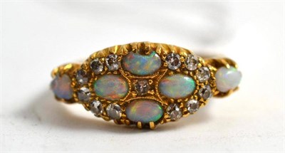 Lot 159 - An 18ct gold opal and diamond ring