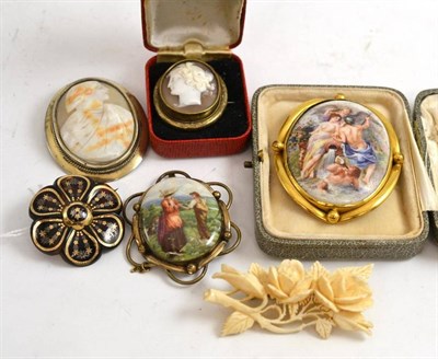 Lot 165 - A tortoiseshell pique brooch, two cameo brooches and three other brooches