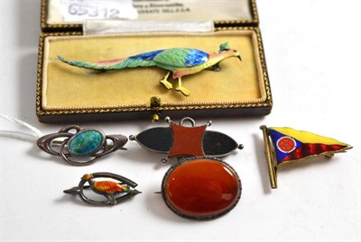 Lot 174 - A silver brooch by Charles Horner and five assorted enamel and other brooches (6)