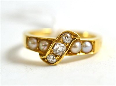 Lot 185 - An 18ct gold diamond and split pearl ring in a box