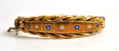 Lot 199 - A sapphire and diamond bangle (a.f.)