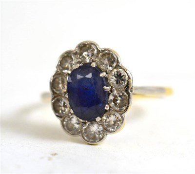 Lot 206 - A sapphire and diamond cluster ring