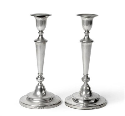 Lot 574 - A Pair of George III Silver Candlesticks, John Roberts & Co, Sheffield 1806, the spreading circular