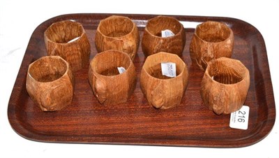 Lot 216 - A set of eight Mouseman napkin rings