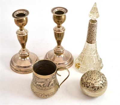 Lot 240 - A pair of silver candlesticks, a scent bottle, a white metal beaker and an Indian box (5)