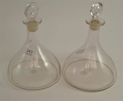 Lot 243 - Two glass ship's decanters and stoppers