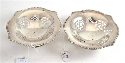 Lot 245 - Pair of white metal pedestal dishes