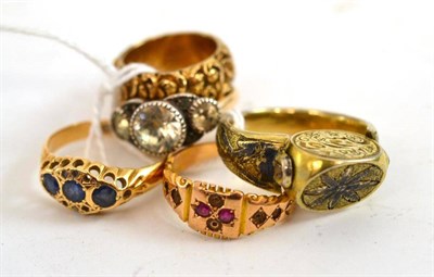 Lot 270 - An 18ct gold ring, a 15ct gold ring and three other rings (some a.f.)