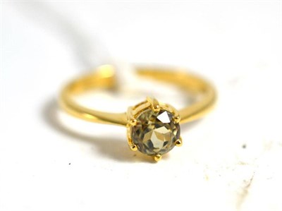 Lot 290 - An 18ct gold solitaire ring - possibly diopside or diaspore