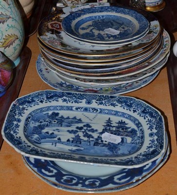 Lot 310 - Assorted Ironstone pottery plates and soup bowls, two small blue and white plates, an 18th...