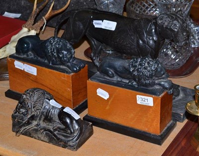 Lot 321 - Anatomical figure of a lion after Riviere, two spelter sleeping lions on wooden raised mounts and a