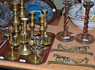 Lot 322 - Four pairs of brass candlesticks, pair of turned oak candlesticks, two hearth ornaments etc