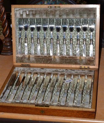 Lot 326 - A set of plate and mother-of-pearl fish knives and forks, cased