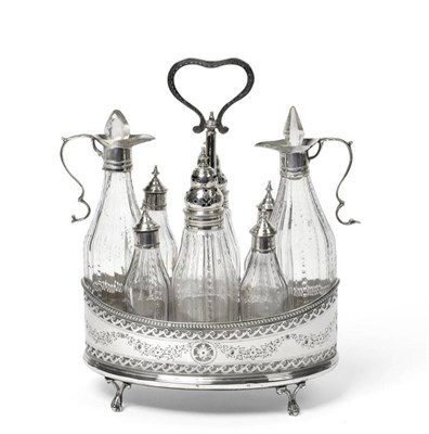 Lot 586 - A George III Silver Condiment Stand and Bottles, Robert Hennell, London 1784, the oval bright...