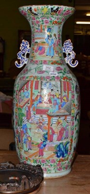 Lot 352 - A 19th century Canton vase with double scrolled handles, decorated with panels and dignitaries,...