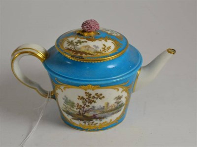 Lot 369 - A Sèvres porcelain teapot, dated for 1758, decorated with vignettes on a turquoise blue...