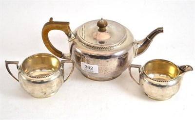 Lot 382 - A George V silver three piece tea service, Birmingham 1922