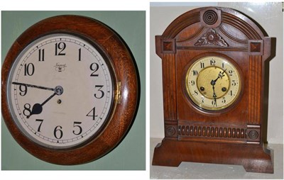 Lot 386 - Circular wall clock and a bracket clock