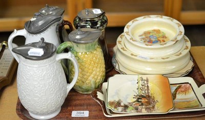 Lot 394 - Seven Royal Doulton plates and five lidded jugs