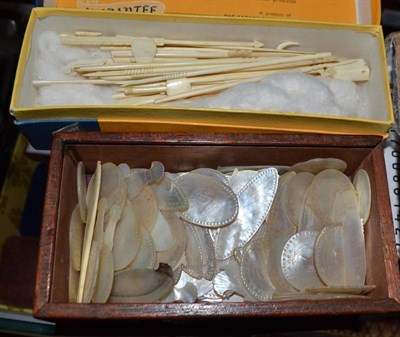 Lot 398 - 19th century Chinese mother-of-pearl, ivory and bone gaming tokens and sticks