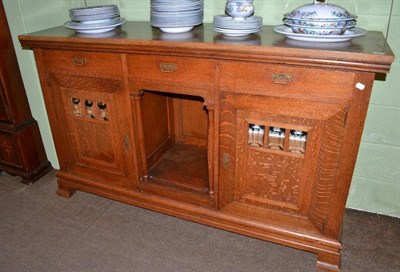 Lot 445 - A large oak Arts & Crafts buffet sideboard