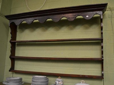 Lot 446 - A Georgian oak wall rack