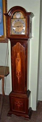 Lot 447 - A three train grandmother clock in a mahogany inlaid case