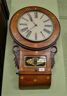 Lot 452 - An inlaid striking wall clock