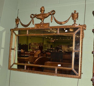 Lot 457 - An Adams style overmantel mirror decorated with urns