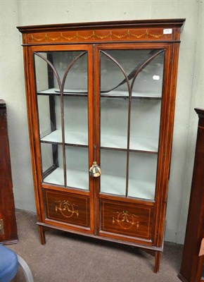 Lot 466 - An Edwardian mahogany glazed display cabinet with painted decoration