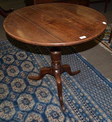 Lot 500 - A George III oak tripod table